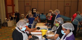 Canadian Bank Note ta duna sosten na Fundacion Pa Nos Comunidad pa yuda famianan den necesidad