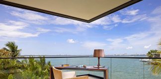 Web a huur edificio luhoso cu beachfront den pleno pandemia; Gobierno a manda pidi nan pa duna cuenta