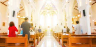 Ta bolbe impone medidanan di precaucion di Covid-19 den Iglesianan