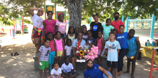 Juffrouw Glynda cumpliendo 25 aña den servicio na YMCA