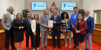 Comision fiho di labor na Parlamento a yama Minister Glenbert Croes pa splica e programa “Aruba kier Traha”