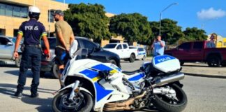 Agente policial di Motor Unit envolvi den accidente di trafico