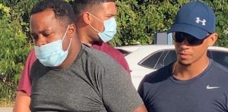 Homber deteni pa menasa di morto di un funcionario di inmigracion