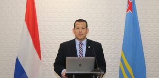 Minister Rocco Tjon a entrega un relato di ocho pagina na parlamento tocante bishita y reunionnan na Hulanda