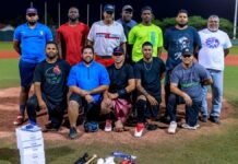 Aruba Bank ta sigui aporta na deporte a haci entrega di material na Braves Baseball Organization