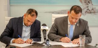 Minister Dangui Oduber a firma un MOU cu Ministerio di Asuntonan Social tocante “Geestelijk Gezondheid Zorg” pa por traha mas estrecho cu otro