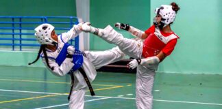 Presidente di Aruba Taekwondo Bond a bishita Central Training.