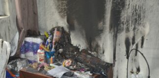 Señora transporta pa Hospitaal despues di a inhala huma di candela for di un camber