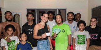 Srta Harms a gana e rifa di Brazil Taekwondo Stichting.