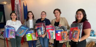 SETAR Stimulando Educacion: Ofreciendo 175 Backpacks pa Aña Escolar Nobo