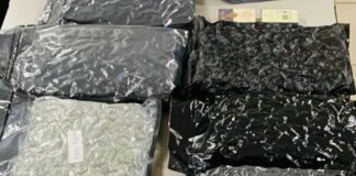 Dos homber deteni den caso grandi di droga den area turistico