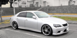 Polis a gara bendedor di droga y su laboratorio mobil na San Nicolas cu arma, placa y droga