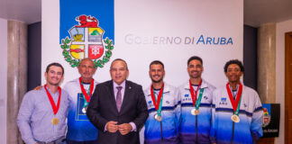 Minister Endy Croes a ricibi seleccion di tennis di Aruba cu a titula campeon di Davis Cup Americas Group iv 2024 na Trinidad y Tobago