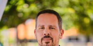 ACCION21 a presenta nan vision na ATIA pa rebaha costo di bida na Aruba