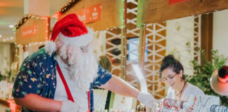 Holiday Markets ta yama bon bini na dianan di fiesta na Hilton Aruba Caribbean Resort & Casino