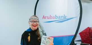 Aruba Bank ta patrocina buki pa reparti entre scolnan basico