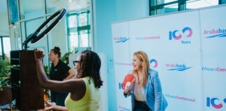 Aruba Bank a celebra Dia di Himno y Bandera: Un experiencia unico pa comunidad y cliente