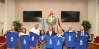 Den conexion cu conscientisacion pa cu abuso sexual contra nos muchanan: Ban tur hunto bisti na blauw y uni den e lucha contra abuso sexual di nos muchanan