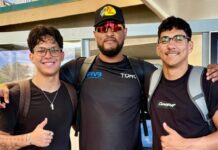 Team Aruba di Beach Volleyball cla pa representa nos pais na Grand Cayman Island