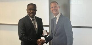 Minister Dowers ta intensifica cooperacion contra crimen digital durante bishita na High Tech Crime na Hulanda