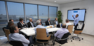 Minister Dowers hunto cu CAFT a ricibi resultado di doorlichting haci di Utilities Aruba NV y AWSS