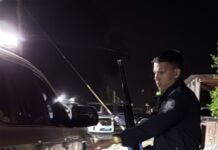 Homber canando cu rifle den Dakota