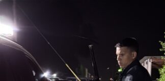 Homber canando cu rifle den Dakota