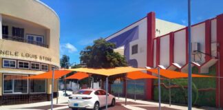 A.T.A. a drecha “canopy” cerca di monumento di Uncle Louis Store