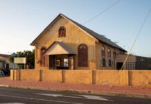 Pastoor Virgil Sams a destaca herencia di comunidad y servicio durante homenahe na Eric Principaal