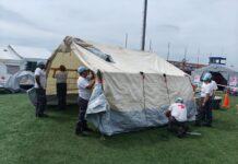 Prome Minister Mike Eman ta sigui di cerca desaroyo di mision humanitario: Boluntarionan Arubiano a yuda mas cu shen pashent den prome dia di operacion na Venezuela