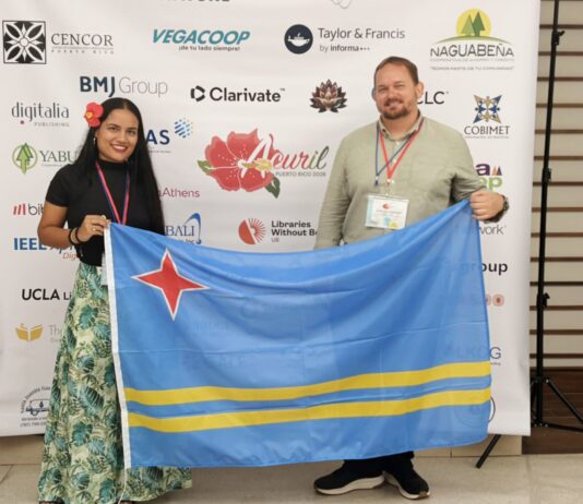 Coleganan di Archivo Nacional Aruba a destaca cu presentacion riba Inteligencia Artificial y investigacion familiar na e conferencia ACURIL na Puerto Rico