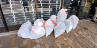 Accion di haci nos isla limpi a cuminsa trempan! Parlamento Hubenil a colecta mas cu 35 saco di sushi den centro di ciudad