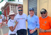 Trabou boluntario ta uni comunidad durante preparacionnan pa Art Week Aruba