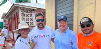 Trabou boluntario ta uni comunidad durante preparacionnan pa Art Week Aruba