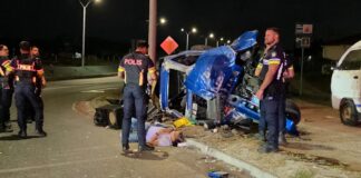 Chauffeur yegando rotonde cu velocidad halto a dal e rotonde kentel y lastra bay otro banda di caminda