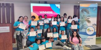 Grupo di studiante local a keda introduci na Aruba su industria di timeshare